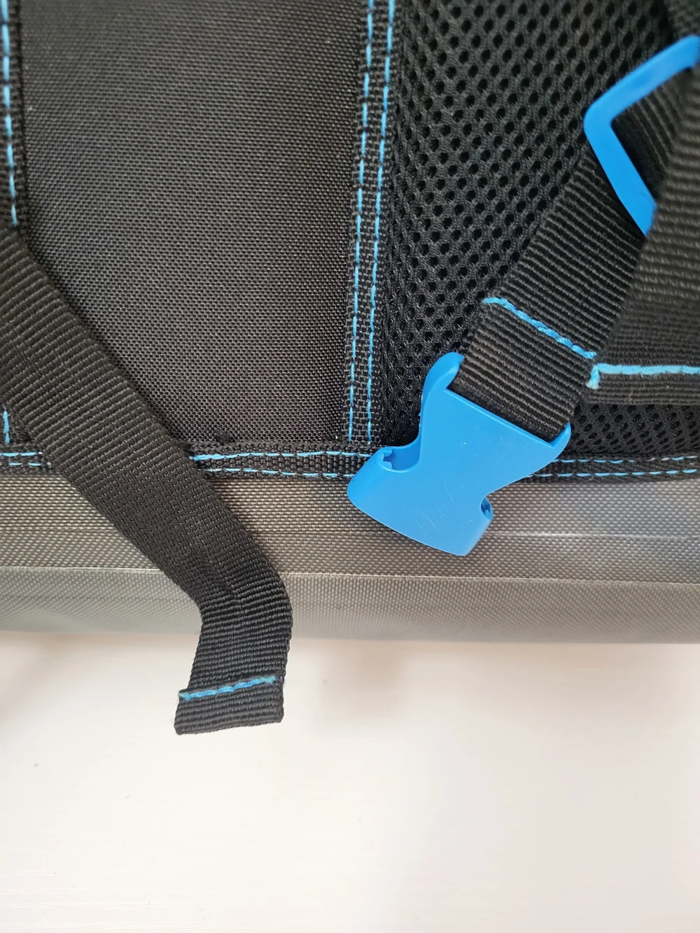 Magellan Outdoors Gray Waterproof Zip Top Backpack with Blue Accents